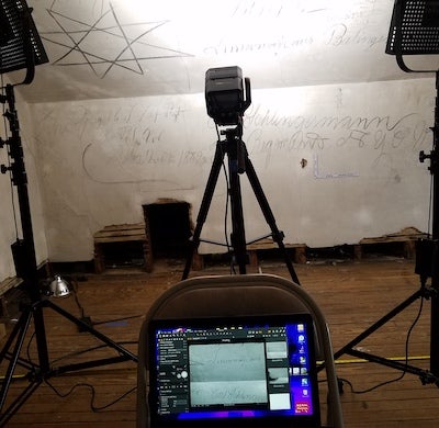 cameras capturing the graffiti