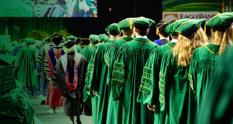 Mason graduate students in line at graduation