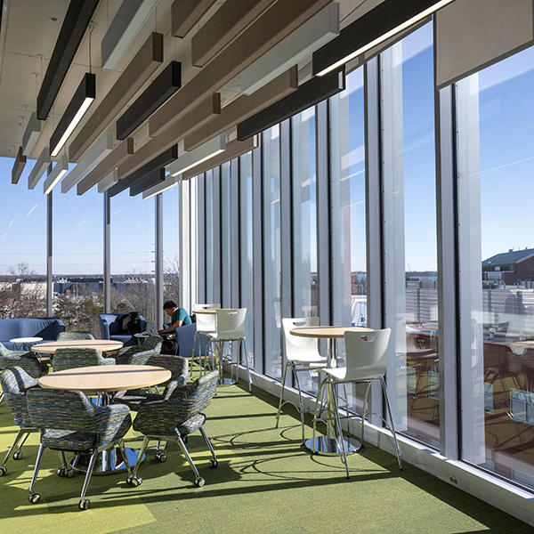 A look inside the Life Sciences and Engineering building - round tables and floor to ceiling windows